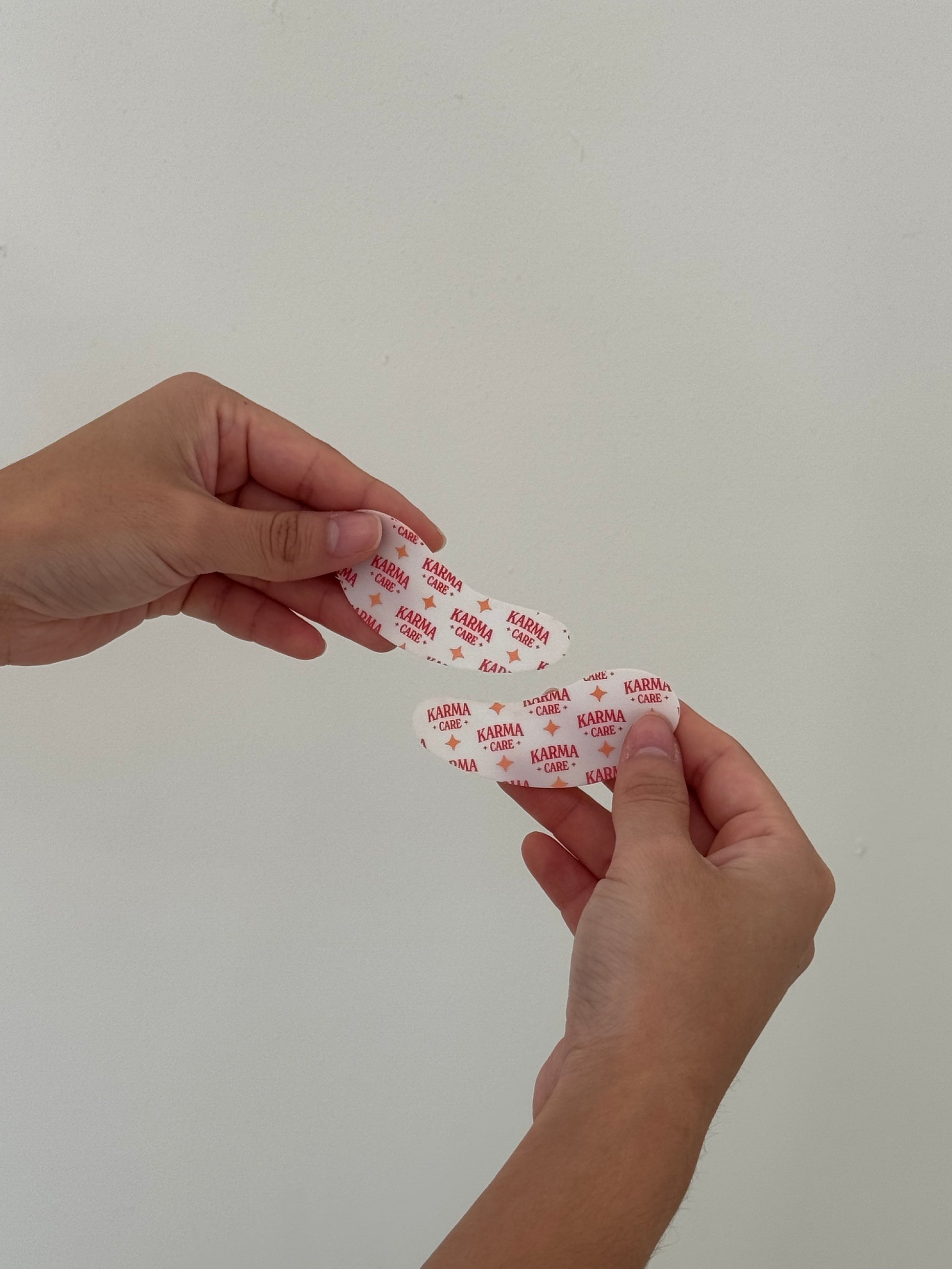 Karma Care eye mask packaging and patches flat lay – sustainable beauty product
